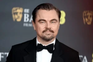 Leonardo DiCaprio biography image showing his age, height, partner and net worth details