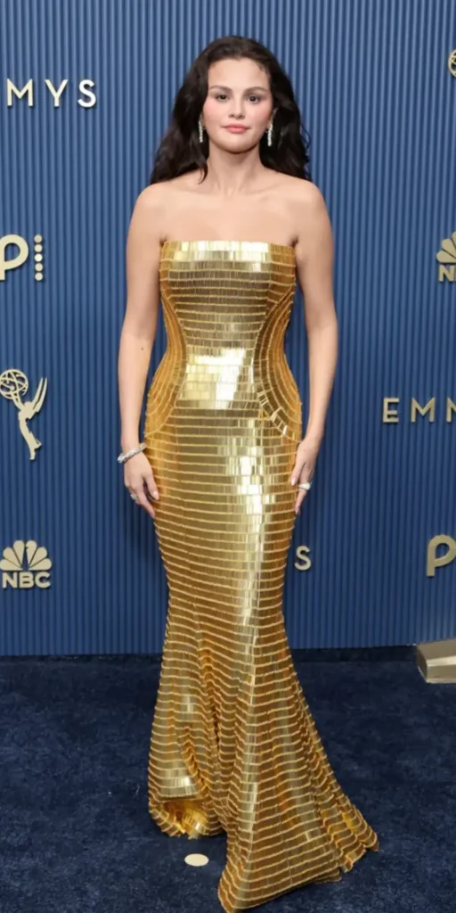 Selena Gomez wearing a gold Louis Vuitton gown at the 2026 Emmy Awards