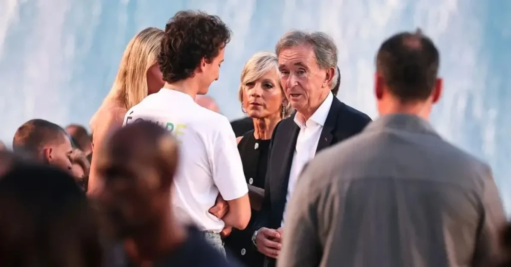 Bernard Arnault arriving at the Louis Vuitton Spring Summer 2027 menswear show with his wife