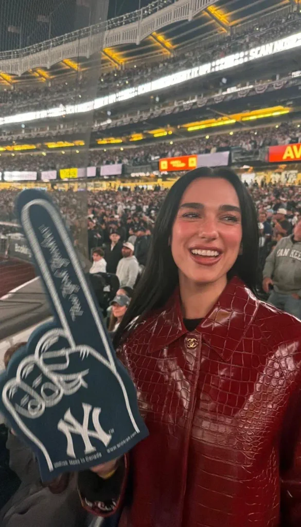 Dua Lipa’s Burgundy Leather coat Look 