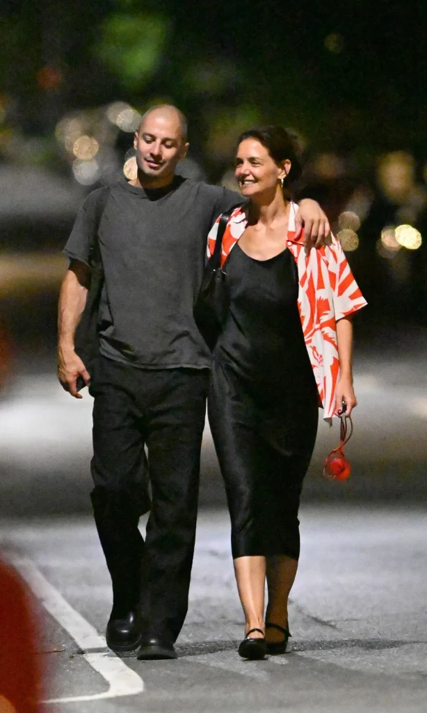 Katie Holmes and Jason Bard Yarmosky smiling together during a dinner outing in New York City