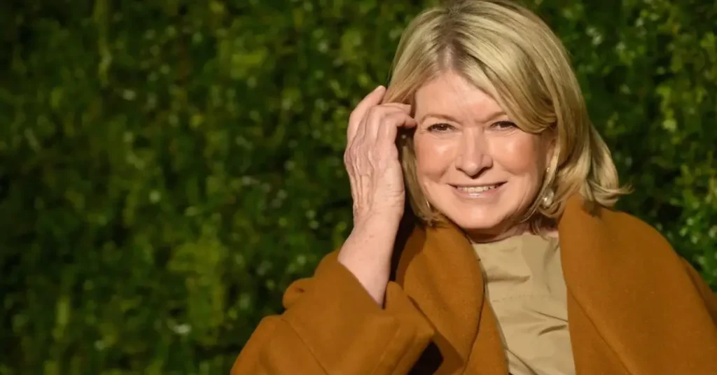 Martha Stewart wearing a brown coat at a public event