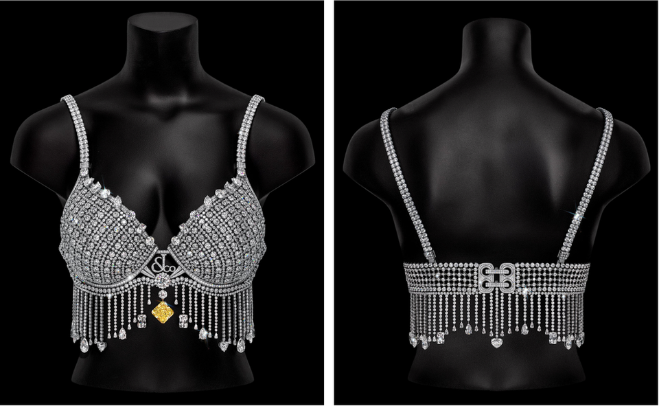 Front and back view of the diamond-encrusted 2026 Victoria’s Secret Fantasy Bra featuring a yellow diamond centerpiece.