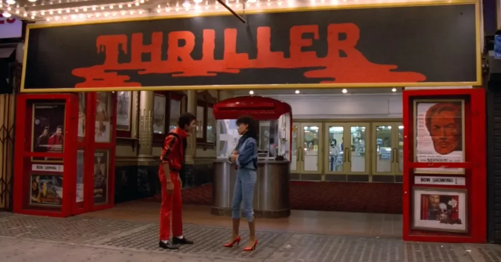 Michael Jackson wearing his iconic Thriller red leather outfi